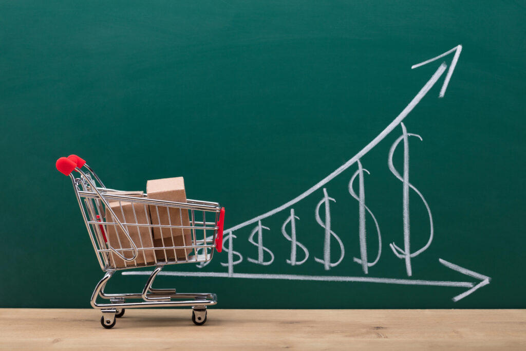 A shopping cart with an upward trending inflation line, symbolizing rising prices and the impact of inflation on retirement savings